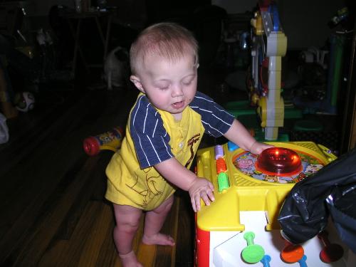 Yes! I know i'm cute! - The first time he pulled himself up!