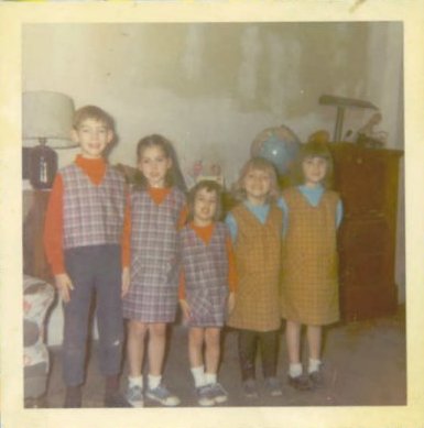 Cousins - This is a pic of my younger sis, myself and 3 of our cousins.
Boy has styles changed or what? 
LOL