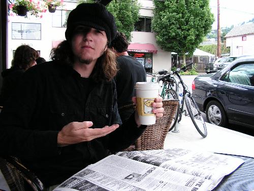 Coffee anyone? - Me, drinking coffee in Portland, Oregon. Delicious wouldn't ya say?