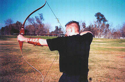 Traditional Archery - Shooting a bow.