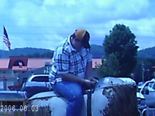 My Husband - This is my husband Greg on a mechanical bull ride.We were on vacation in Pigeon Forge,Tennessee.This was the funniest thing I have ever seen.