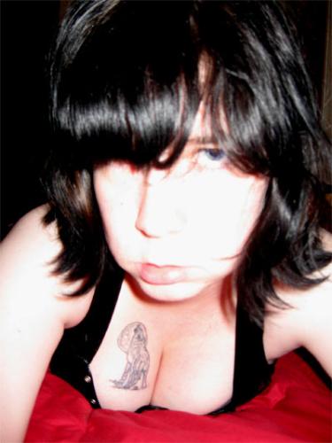 In Bed - Just another photo of me, taken with my digicam.