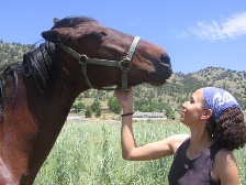 me and my horse - My horse is a 11 year old Standardbred mare. She is about 15.3 hands. I have owned her for about 3 years. I love that horse!