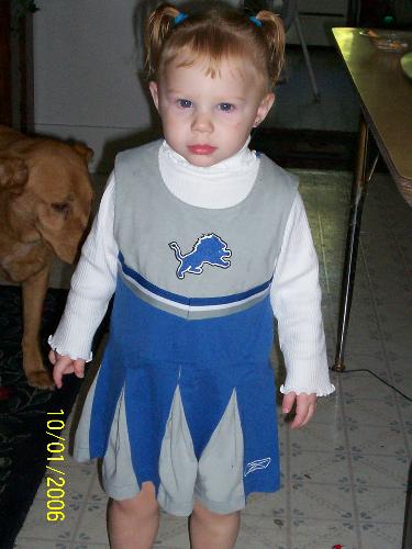My beautiful daughter! - This is Olivia Rose.  Isn't she beautiful!?!  As you can tell by the look on her face, she doesn't like to have her picture taken! lol.  She'll make an adorable cheer leader one day...she already does! :-)