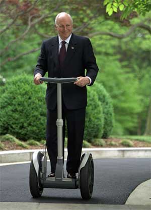 Richard Cheney. - 




This is a photograph of our Vice President Richard Cheney riding a Segway. Nice to see he has time to enjoy himself with all that&#039;s going on in the world..including the Iraq War..supposed oil shortages..and many other events.
