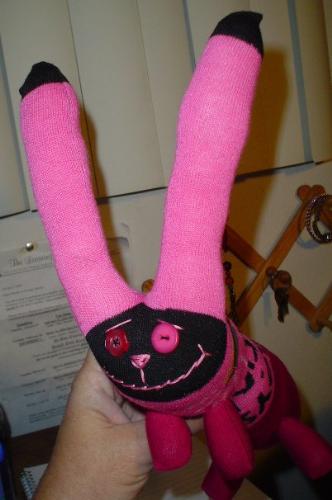 Another bunny - Bunny made from socks that say 'Stinky boy.'