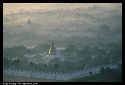 Kuthodaw Paya at sunrise. Mandalay, Myanmar  - Founded on 23 May 1859 by King Mindon Min[1], Mandalay was the last capital (1860–1885) of the last independent Burmese Kingdom before annexation by the British after the Third Anglo-Burmese War in 1885.  Unlike other Burmese towns, Mandalay did not grow from a smaller settlement to town proportions although there did exist a village by the name of Htee Baunga nearby. Mandalay was set up in an empty area at the foot of 236 meter Mandalay Hill according to a prophecy made by the Buddha that in that exact place a great city, a metropolis of Buddhism, would come into existence on the occasion of the 2,400th jubilee of Buddhism.