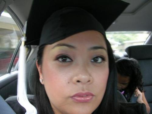 Cap and Gown - This was me on the way to graduation for my MA.