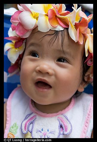 Baby girl  - Baby girl wearing a flower lei on her head. Waikiki, Honolulu, Oahu island, Hawaii, USA 