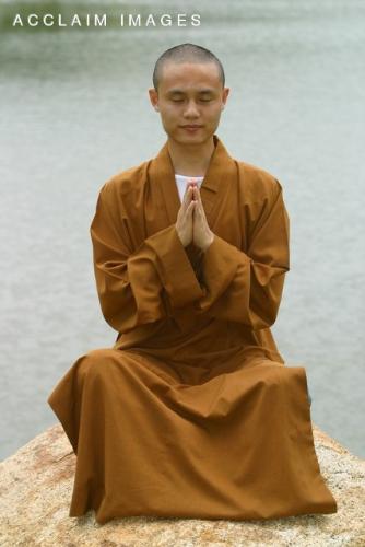 Monk meditating - Budhist Monk meditating