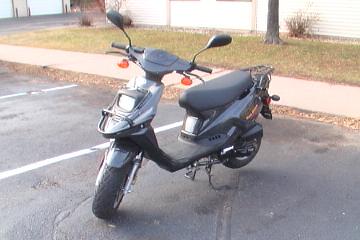my moped - this is my moped i love it. it gets around 70 miles to the gallon its pretty much the best thing ever