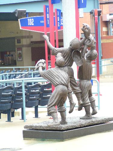 Fifth Third Field at Triple-A All-Star Game in Tol - This photo is of bronzen statues in the outfield at Fifth Third Field in Toledo, Ohio. I took it while there for the Triple-A All-Star Game in 2006.
