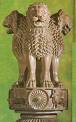 India National Emblem - The four lions (one hidden from view), symbolising power, courage and confidence, rest on a circular abacus. The abacus is girded by four smaller animals, that are considered guardians of the four directions: the lion of the north, the elephant of the east, the horse of the south and the bull of the west. The abacus rests on a lotus in full bloom, exemplifying the fountainhead of life and creative inspiration.