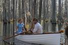 The Notebook -  	 Plot Summary for The Notebook (2004)  The movie focuses on an old man reading a story to an old woman in a nursing home. The story he reads follows two young lovers named Allie Hamilton and Noah Calhoun, who meet one evening at a carnival. But they are separated by Allie's parents who dissaprove of Noah's unwealthy family, and move Allie away. After waiting for Noah to write her for several years, Allie meets and gets engaged to a handsome young soldier named Lon. Allie, then, with her love for Noah still alive, stops by Noah's 200-year-old home that he restored for her, 'to see if he's okay'. It is evident that they still have feelings for each other, and Allie has to choose between her fiancé and her first love.