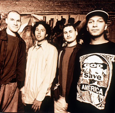 Rage Against the Machine pictures - Rage Against the Machine earned acclaim from disenfranchised fans (and not insignificant derision from critics) for their bombastic, fiercely polemical music, which brewed sloganeering leftist rants against corporate America, cultural imperialism, and government oppression into a Molotov cocktail of punk, hip-hop, and thrash. Rage formed in Los Angeles in the early '90s out of the wreckage of a number of local groups: vocalist Zack de la Rocha (the son of Chicano political artist Beto) emerged from the bands Headstance, Farside, and Inside Out; guitarist Tom Morello (the nephew of Jomo Kenyatta, the first Kenyan president) originated in Lock Up; and drummer Brad Wilk played with future Pearl Jam frontman Eddie Vedder. Rounded out by bassist Tim Bob (aka Tim C., born Tim Commerford), a childhood friend of de la Rocha's, Rage debuted in 1992 with a self-released, self-titled 12-song cassette featuring the song 'Bullet in the Head,' which became a hit when reissued as a single later in the year.