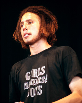 Rage Against the Machine pictures - Rage Against the Machine earned acclaim from disenfranchised fans (and not insignificant derision from critics) for their bombastic, fiercely polemical music, which brewed sloganeering leftist rants against corporate America, cultural imperialism, and government oppression into a Molotov cocktail of punk, hip-hop, and thrash. Rage formed in Los Angeles in the early '90s out of the wreckage of a number of local groups: vocalist Zack de la Rocha (the son of Chicano political artist Beto) emerged from the bands Headstance, Farside, and Inside Out; guitarist Tom Morello (the nephew of Jomo Kenyatta, the first Kenyan president) originated in Lock Up; and drummer Brad Wilk played with future Pearl Jam frontman Eddie Vedder. Rounded out by bassist Tim Bob (aka Tim C., born Tim Commerford), a childhood friend of de la Rocha's, Rage debuted in 1992 with a self-released, self-titled 12-song cassette featuring the song 'Bullet in the Head,' which became a hit when reissued as a single later in the year.