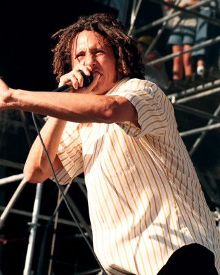 Rage Against the Machine pictures - Rage Against the Machine earned acclaim from disenfranchised fans (and not insignificant derision from critics) for their bombastic, fiercely polemical music, which brewed sloganeering leftist rants against corporate America, cultural imperialism, and government oppression into a Molotov cocktail of punk, hip-hop, and thrash. Rage formed in Los Angeles in the early '90s out of the wreckage of a number of local groups: vocalist Zack de la Rocha (the son of Chicano political artist Beto) emerged from the bands Headstance, Farside, and Inside Out; guitarist Tom Morello (the nephew of Jomo Kenyatta, the first Kenyan president) originated in Lock Up; and drummer Brad Wilk played with future Pearl Jam frontman Eddie Vedder. Rounded out by bassist Tim Bob (aka Tim C., born Tim Commerford), a childhood friend of de la Rocha's, Rage debuted in 1992 with a self-released, self-titled 12-song cassette featuring the song 'Bullet in the Head,' which became a hit when reissued as a single later in the year.