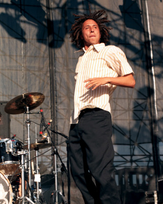 Rage Against the Machine pictures - Rage Against the Machine earned acclaim from disenfranchised fans (and not insignificant derision from critics) for their bombastic, fiercely polemical music, which brewed sloganeering leftist rants against corporate America, cultural imperialism, and government oppression into a Molotov cocktail of punk, hip-hop, and thrash. Rage formed in Los Angeles in the early '90s out of the wreckage of a number of local groups: vocalist Zack de la Rocha (the son of Chicano political artist Beto) emerged from the bands Headstance, Farside, and Inside Out; guitarist Tom Morello (the nephew of Jomo Kenyatta, the first Kenyan president) originated in Lock Up; and drummer Brad Wilk played with future Pearl Jam frontman Eddie Vedder. Rounded out by bassist Tim Bob (aka Tim C., born Tim Commerford), a childhood friend of de la Rocha's, Rage debuted in 1992 with a self-released, self-titled 12-song cassette featuring the song 'Bullet in the Head,' which became a hit when reissued as a single later in the year.