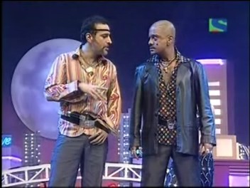 BOO!!!!!! - This picture shows Naved and Ravi at the comic best,Not only are they funny but are witty too,On this show,nothing is taken seriously,its all good fun to watch and to partcipate.