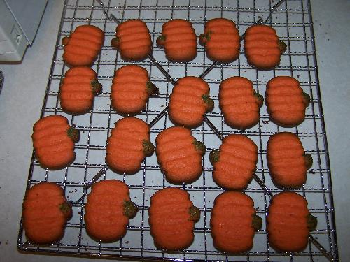 Pumpkin cookies - Here's a picture of the pumpkin cookies my son and I made last week.  They were made with a cookie press.