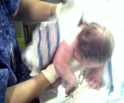 David, just born - This is when they pulled him out and wrapped him up.