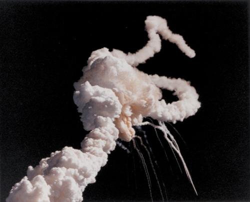 Challenger space shuttle - The Space Shuttle Challenger disaster was a space disaster that occurred at 11:39 a.m. EST on January 28, 1986, when the NASA Space Shuttle Challenger disintegrated 73 seconds into its flight after an O-ring seal in its right solid rocket booster (SRB) failed. The seal failure caused a flame leak from the solid rocket booster that impinged upon the adjacent external propellant tank. Within seconds, the flame caused structural failure of the external tank, and the orbiter broke up abruptly due to aerodynamic forces. The shuttle was destroyed and all seven crew members were killed, probably when the crew compartment hit the surface of the ocean. The crew compartment and many other vehicle fragments were eventually recovered from the ocean floor after a lengthy search and rescue operation.  The disaster resulted in a 32-month hiatus in the shuttle program and the formation of the Rogers Commission, a special commission appointed by President Ronald Reagan to investigate the accident. The Rogers Commission found that NASA's organizational culture and decision-making processes had been a key contributing factor to the accident. NASA managers had known that contractor Morton Thiokol's design of the SRBs contained a potentially catastrophic flaw, but failed to address it properly. They also ignored warnings from engineers about the dangers of launching on such a cold day, and had failed to adequately report these technical concerns to their superiors. The Rogers Commission offered NASA nine recommendations that were to be implemented before shuttle flights resumed.  Many schoolchildren saw the launch live due to the presence on the crew of Christa McAuliffe, the first member of the Teacher in Space Project. Media coverage of the accident was extensive: one study reported that 85 percent of Americans surveyed in a poll had heard the news within an hour of the accident. The Challenger disaster has been used as a case study in many discussions of engineering safety and workplace ethics and has inspired a television movie, Challenger, which was made in 1990.