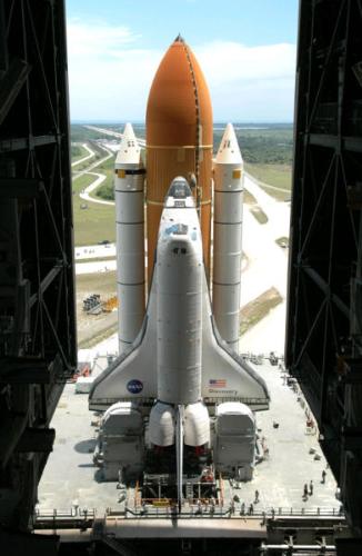 Space shuttle discovery - Space Shuttle Discovery (NASA Orbiter Vehicle Designation: OV-103) is one of three remaining spacecraft in the Space Shuttle fleet belonging to the U.S. National Aeronautics and Space Administration (NASA). First flown in 1984, Discovery is the third operational Space Shuttle and as the oldest shuttle in service, Discovery is also the flagship of NASA. Discovery has performed both research and International Space Station (ISS) assembly missions.  The spacecraft takes its name from previous ships of exploration named Discovery, primarily HMS Discovery, the sailing ship that accompanied famous explorer James Cook on his third and final major voyage. Others include Henry Hudson's ship Discovery which he used in 1610–1611 to search for a Northwest Passage, and RRS Discovery, a vessel used for expeditions to Antarctica in 1901-1904 by Scott and Shackleton (and still preserved as a museum). The shuttle shares a name with Discovery One, the fictional femur-shaped Jupiter spaceship from the films 2001: A Space Odyssey and 2010: The Year We Make Contact.  Discovery was the shuttle that launched the Hubble Space Telescope. The second and third Hubble service missions were also conducted by Discovery, and she is currently scheduled to perform the fifth one sometime in 2008. She has also launched the Ulysses probe and three TDRS satellites. Discovery has been chosen twice as the return to flight orbiter, first as the return to flight orbiter after the 1986 Challenger disaster in 1988, and as the orbiter for the twin return to flight missions in July 2005 and July 2006, after the 2003 Columbia disaster. Discovery also carried Project Mercury astronaut John Glenn, who was 77 at the time, back into space during STS-95 on October 29, 1998, making him the oldest human being to venture into space.  Had the planned DOD shuttle missions from Vandenberg Air Force Base gone ahead, Discovery would have flown these missions