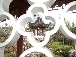 Japanese garden - Vancouver - This is a view of a beautiful Japanese garden in Vancouver, Canada. It is taken through one of the many shaped walls in the garden.
