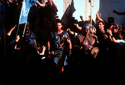 Gladiator - In the final days of Marcus Aurelius' reign, the aging emperor angers his son Commodus by making it known that he wants Maximus, a fearsome and respected Roman general, to be his successor. Power-hungry Commodus kills his father and orders the death of Maximus. But the latter flees, only to discover that his wife and child have been murdered by Commodus. Captured, Maximus is forced into slavery, where he is sold to Proximo, a former gladiator who serves as both mentor and slavemaster. Maximus trains as a gladiator in the arena, where his fame grows. He goes to Rome, intent on avenging the murder of his wife and son by killing the new emperor Commodus. Maximus has learned that the one power stronger than that of the emperor is the will of the people, and he knows he can only attain his revenge by becoming the greatest hero in all the empire.
