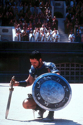 Gladiator - In the final days of Marcus Aurelius' reign, the aging emperor angers his son Commodus by making it known that he wants Maximus, a fearsome and respected Roman general, to be his successor. Power-hungry Commodus kills his father and orders the death of Maximus. But the latter flees, only to discover that his wife and child have been murdered by Commodus. Captured, Maximus is forced into slavery, where he is sold to Proximo, a former gladiator who serves as both mentor and slavemaster. Maximus trains as a gladiator in the arena, where his fame grows. He goes to Rome, intent on avenging the murder of his wife and son by killing the new emperor Commodus. Maximus has learned that the one power stronger than that of the emperor is the will of the people, and he knows he can only attain his revenge by becoming the greatest hero in all the empire.