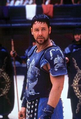 Gladiator - In the final days of Marcus Aurelius' reign, the aging emperor angers his son Commodus by making it known that he wants Maximus, a fearsome and respected Roman general, to be his successor. Power-hungry Commodus kills his father and orders the death of Maximus. But the latter flees, only to discover that his wife and child have been murdered by Commodus. Captured, Maximus is forced into slavery, where he is sold to Proximo, a former gladiator who serves as both mentor and slavemaster. Maximus trains as a gladiator in the arena, where his fame grows. He goes to Rome, intent on avenging the murder of his wife and son by killing the new emperor Commodus. Maximus has learned that the one power stronger than that of the emperor is the will of the people, and he knows he can only attain his revenge by becoming the greatest hero in all the empire.