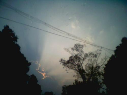 Sunlight - The photo has been taken right after a heavy hailstorm. The first rays of sunlight are coming out.