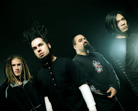 Static - X Images -  Static-X's roots trace to the Midwest, where vocalist/guitarist Wayne Static grew up in Michigan and drummer Ken Jay in Illinois. They ended up in Chicago separately, but were introduced at the record store where Jay worked by Smashing Pumpkins vocalist Billy Corgan. Static and Jay decided to head west to California and start up a new band. Shortly after their arrival, Osaka-native Koichi Fukada responded to the duo's ad and became their new guitarist, as well as programmer. Bassist Tony Campos, the only true Californian, was the final piece of the puzzle. Static X's music combined aggressive metal and thrash with industrial overtones and techno pulse. Signed to Warner Brothers in February 1998, Static X debuted with Wisconsin Death Trip a year later, and the album was eventually certified gold. Departing guitarist Fukada was replaced with Tripp Eisen (ex-Dope) for 2001's Machine, and drummer Jay left after the 2003 album Shadow Zone. If that wasn't enough, personal issues forced Eisen to leave the band in 2004. Still, Static-X was undeterred. Static tapped Fukada to rejoin on guitar and programming, and touring drummer Nick Oshiro took over full-time. In June 2005, a rejunvenated Static-X returned to recording with Start a War. Josh Loehr