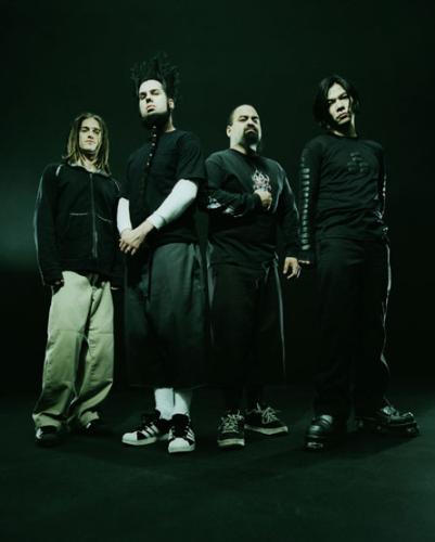 Static - X Images -  Static-X's roots trace to the Midwest, where vocalist/guitarist Wayne Static grew up in Michigan and drummer Ken Jay in Illinois. They ended up in Chicago separately, but were introduced at the record store where Jay worked by Smashing Pumpkins vocalist Billy Corgan. Static and Jay decided to head west to California and start up a new band. Shortly after their arrival, Osaka-native Koichi Fukada responded to the duo's ad and became their new guitarist, as well as programmer. Bassist Tony Campos, the only true Californian, was the final piece of the puzzle. Static X's music combined aggressive metal and thrash with industrial overtones and techno pulse. Signed to Warner Brothers in February 1998, Static X debuted with Wisconsin Death Trip a year later, and the album was eventually certified gold. Departing guitarist Fukada was replaced with Tripp Eisen (ex-Dope) for 2001's Machine, and drummer Jay left after the 2003 album Shadow Zone. If that wasn't enough, personal issues forced Eisen to leave the band in 2004. Still, Static-X was undeterred. Static tapped Fukada to rejoin on guitar and programming, and touring drummer Nick Oshiro took over full-time. In June 2005, a rejunvenated Static-X returned to recording with Start a War. Josh Loehr