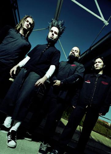 Static - X Images -  Static-X's roots trace to the Midwest, where vocalist/guitarist Wayne Static grew up in Michigan and drummer Ken Jay in Illinois. They ended up in Chicago separately, but were introduced at the record store where Jay worked by Smashing Pumpkins vocalist Billy Corgan. Static and Jay decided to head west to California and start up a new band. Shortly after their arrival, Osaka-native Koichi Fukada responded to the duo's ad and became their new guitarist, as well as programmer. Bassist Tony Campos, the only true Californian, was the final piece of the puzzle. Static X's music combined aggressive metal and thrash with industrial overtones and techno pulse. Signed to Warner Brothers in February 1998, Static X debuted with Wisconsin Death Trip a year later, and the album was eventually certified gold. Departing guitarist Fukada was replaced with Tripp Eisen (ex-Dope) for 2001's Machine, and drummer Jay left after the 2003 album Shadow Zone. If that wasn't enough, personal issues forced Eisen to leave the band in 2004. Still, Static-X was undeterred. Static tapped Fukada to rejoin on guitar and programming, and touring drummer Nick Oshiro took over full-time. In June 2005, a rejunvenated Static-X returned to recording with Start a War. Josh Loehr