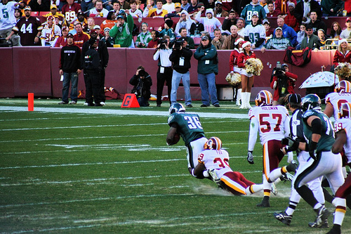 Washington Redskins vs. Phlidephia Eagles pt. 7 - A washington redskins player getting a open field tackle.