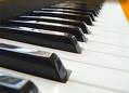 Ivories - Do you tinkle the ivories? Here's a little information on pianos from wikipedia.  A piano or pianoforte is a musical instrument classified as a keyboard, percussion, or string instrument, depending on the system of classification used. The piano produces sound by striking steel strings with felt hammers that immediately rebound allowing the string to continue vibrating. These vibrations are transmitted through the bridges to the soundboard, which amplifies them.  The piano is widely used in western music for solo performance, chamber music, and accompaniment. It is also very popular as an aid to composing and rehearsal. Although not portable and often expensive, the piano's versatility and ubiquity has made it among the most familiar of musical instruments.  The word piano is a shortened form of the word pianoforte, which is seldom used except in formal language and derived from the original Italian name for the instrument, gravicèmbalo col piano e forte (literally harpsichord with soft and loud). This refers to the ability of the piano to produce notes at different volumes depending on the amount of force used to press the keys.