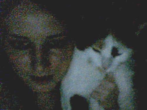 Ariel and I Posing for the Webcam - So it's not the best photo of me ever taken. But isn't Ariel cute? Yes, I'm an overly proud parent, and I love my babydoll. So sue me!