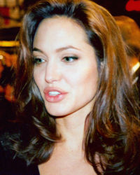 angelina - Angelina Jolie (born Angelina Jolie Voight on June 4, 1975) is an American film actress, a former fashion model and a Goodwill Ambassador for the UN Refugee Agency. She is often cited by popular media as one of the world&#039;s most beautiful women[1] and her off-screen life is widely reported. She has received three Golden Globe Awards, two Screen Actors Guild Awards and an Academy Award.
Jolie&#039;s acting career began with the low budget production Cyborg 2 (1993) and she played her first leading role in a major film in Hackers (1995). She appeared in the critically acclaimed biographical films George Wallace (1997) and Gia (1998), and won an Academy Award for Best Supporting Actress for her performance in the drama Girl, Interrupted (1999). She achieved international fame as a result of her portrayal of videogame heroine Lara Croft in Lara Croft: Tomb Raider (2001), and since then has established herself as one of the best known and highest paid actresses in Hollywood. She had her biggest commercial success with the action-comedy Mr.& Mrs. Smith (2005).[2]Divorced from actors Jonny Lee Miller and Billy Bob Thornton, Jolie currently lives with actor Brad Pitt, in a relationship that has attracted worldwide media attention.[3] Jolie and Pitt have two adopted children, Maddox and Zahara, and a biological child, Shiloh. Jolie has promoted humanitarian causes throughout the world, and is noted for her work with refugees through UNHCR
Early life and family
Born in Los Angeles, California, Jolie is the daughter of actors Jon Voight and Marcheline Bertrand. She is the niece of Chip Taylor, sister of James Haven and the god-daughter of Jacqueline Bisset and Maximilian Schell. People often assume that Jolie&#039;s mother is French, because of her name, but Jolie&#039;s grandparents were French-Canadian.[4] She is of Czech descent on her father&#039;s side, and French-Canadian and Iroquois on her mother&#039;s side.[5][6]After her parents&#039; divorce in 1976, Jolie and her brother were raised by their mother, who abandoned her acting ambitions and moved with them to Palisades, New York.[7] As a child Jolie collected snakes and lizards and had a crush on Mr. Spock. She regularly saw movies with her mother and later explained that this had inspired her interest in acting; she had not been influenced by her father.[8] When she was 11, the family moved back to Los Angeles and Jolie decided she wanted to act and enrolled at the Lee Strasberg Theatre Institute, where she trained for two years and appeared in several stage productions. She later recalled her time as a student at Beverly Hills High School (later Moreno High School), and her feeling of isolation among the children of some of the area&#039;s more affluent families. Jolie&#039;s mother survived on a more modest income, and Jolie often wore second-hand clothes. She was teased by other students who also targeted her for her distinctive features, for being extremely thin, and for wearing glasses and braces.[8] Her self esteem was further diminished when her initial attempts at modeling proved unsuccessful. As her despondency grew, she started to cut herself; later commenting during an appearance on CNN,"I collected knives and always had certain things around. For some reason, the ritual of having cut myself and feeling the pain, maybe feeling alive, feeling some kind of release, it was somehow therapeutic to me."[9] At 14, she dropped out of her acting classes and dreamed of becoming a funeral director.[10] Her self-loathing led her to embark on a rebellious period in her life; she wore black, dyed her hair purple and went out moshing with her live-in boyfriend.[8] Two years later, after the relationship had ended, she rented an apartment above a garage a few blocks from her mother&#039;s home.[7] She returned to theatre studies and graduated from high school, though in recent time she has referred to this period with the observation,"I am still at heart just a punk kid with tattoos".[11]Jolie has been long estranged from her father, blaming his infidelity for the break-up of the family, though a reconciliation was attempted, and he appeared with her in Lara Croft: Tomb Raider. In July 2002, Jolie filed a request to legally change her name to"Angelina Jolie", dropping Voight as her surname; the name change was made official on September 12, 2002.[12] In August of the same year, Voight claimed that his daughter had"serious emotional problems" on Access Hollywood. In the October 2004 issue of Premiere Magazine, Jolie indicated that she no longer wished to pursue a relationship with her father, and said,"My father and I don’t speak. I don’t hold any anger toward him. I don’t believe that somebody’s family becomes their blood. Because my son’s adopted, and families are earned." She stated that she did not want to publicize her reasons for her estrangement from her father, but because she had adopted her son Maddox, she did not think it was healthy for her to associate with Voight.[13] Voight has not met his grandchildren.[14]
(source wikipedia)