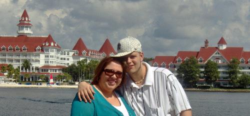 Vacation - My husband and I standing in front of the Grand Floridian in Orlando FL
