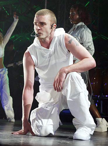 justin timberlake... dancer pop artist - justin timberlake... dancer pop artist  Justin Randall Timberlake was born to Lynn Harless and Randy Timberlake on January 31, 1981, in Memphis, Tennessee. At the age of 11, he appeared on the show 'Star Search' (1983), and even though he didn't win, it didn't dampen his ambitions. He also appeared on 'MMC' (1989), where his costars included Britney Spears, Ryan Gosling, Keri Russell, Christina Aguilera and future bandmate J.C. Chasez. At age 14 Justin became a member of the boy band *NSYNC. In 1998 the group released their self-titled debut album. They became a big hit with fans and made a place for themselves in the music world with a succession of big-selling albums. In the beginning of 2002 Justin spent time working on and writing songs for his debut solo album. During this time he broke up with his longtime girlfriend, Britney Spears. The release of the solo album, titled 'Justified', came in November of 2002. Songs from his solo album include: 'Like I Love You', 'Cry Me A River', and 'Rock Your Body.'