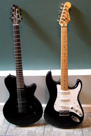 Electric Guitar - An electric guitar is a type of guitar that uses electronic pickups to convert the vibration of its steel-cored strings into electrical current.