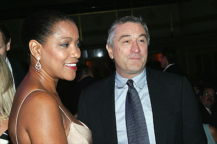 robert deniro - as i see here i think...but i'm not sure he is whit whitney houston. BUT I'M NOT SURE