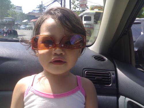 gotta wear shades! - notice the way she wore those dark glasses.