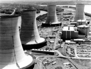 3 mile Island Accident - Three Mile Island Nuclear Generating Station consists of two nuclear power plants, each with its own containment building and cooling towers. TMI-2, which suffered a partial meltdown, is in the background. 3 mile Island Accident - Three Mile Island Nuclear Generating Station consists of two nuclear power plants, each with its own containment building and cooling towers. TMI-2, which suffered a partial meltdown, is in the background.
