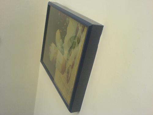 Painting on the Wall - The Painting hung on the wall of a Ice Cream Parlor.
