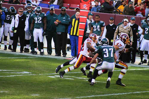 Washington Redskins vs. Phlidephia Eagles pt. 12 - The washington redskins player running with the football.