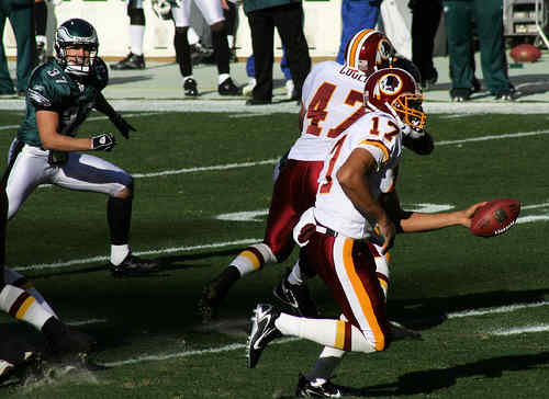Washington Redskins vs. Phlidephia Eagles pt. 13 - The qb about to hand the ball off to another player.
