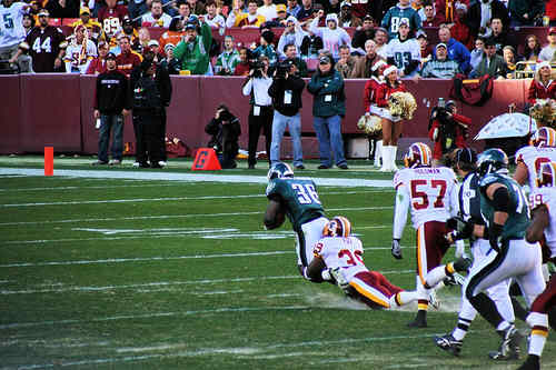 Washington Redskins vs. Phlidephia Eagles pt. 20 - One of the washington redskin players getting the open field tackle.