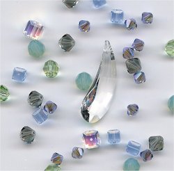swarovski by wikipedia - Swarovski crystal was born when Bohemian-born Daniel Swarovski invented an automatic cutting machine in 1892. In 1895 the Swarovski company was founded when he established a crystal cutting factory in Wattens (near Innsbruck, Tyrol, Austria). Here he could take advantage of local hydroelectricity for the energy-intensive grinding processes he had patented.

Swarovski crystal contains approximately 32% lead to maximize refraction. The Swarovski Crystal range includes crystal sculptures and miniatures, jewelry and couture, home decor, chandeliers, and beads and rhinestones for manufacturers and artists.

 
Swarovski crystal beadsIn order to create a crystal that allows light to refract in a rainbow spectrum, Swarovski coats some of its crystals with special metallic chemical coatings. Aurora Borealis, or "AB", is one of the most popular coatings, and gives the surface a rainbow oil slick appearance. Other coatings include Crystal Transmission, Volcano, Aurum, and Dorado. Coatings are applied to 50% of an object, however some are coated two times, and thus are designated AB 2X, Dorado 2X etc.

The original Swarovski logo was an edelweiss flower, but was replaced with the current swan logo in 1988. All sculptures are marked with this logo. A recent development was the 2004 release of a new copyrighted cut, Xilion, designed to optimise the brilliance of Roses (crystal components with flat backs) and Chatons (diamond cut).

-- wikipedia